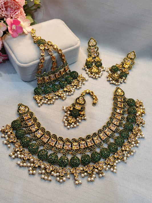 Flexible mini bridal set with jhoomar, tikka and earrings in Emerald Green antique gold