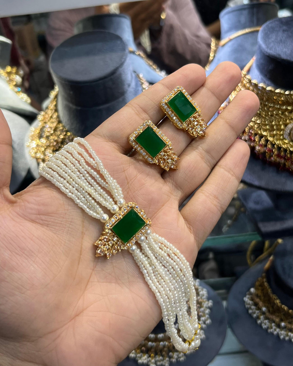 Gold polish zarqoon pearl choker set with earrings, emerald green stone