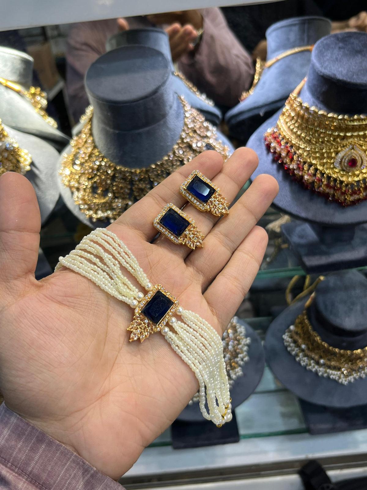 Gold polish zarqoon pearl choker set with earrings, navy blue stone