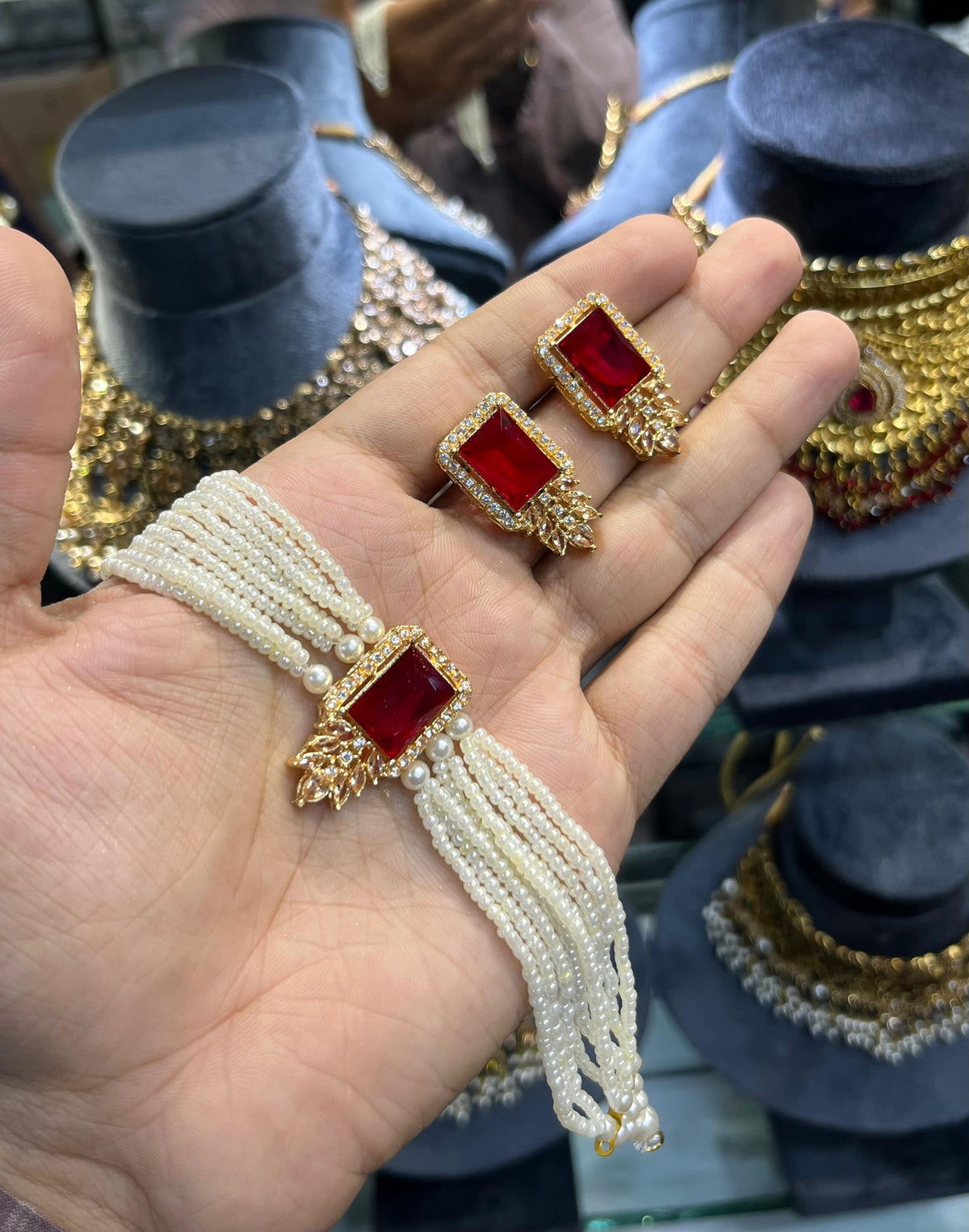 Gold polish zarqoon pearl choker set with earrings, ruby red stone
