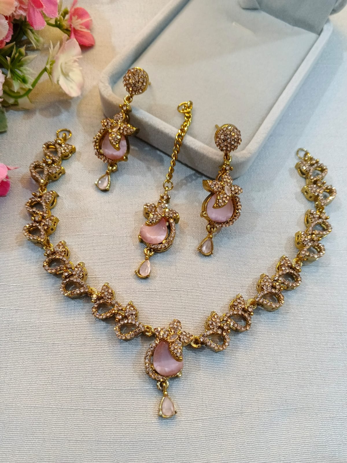 Brown polish zircon necklace set with earrings and tikka, blush pink stones