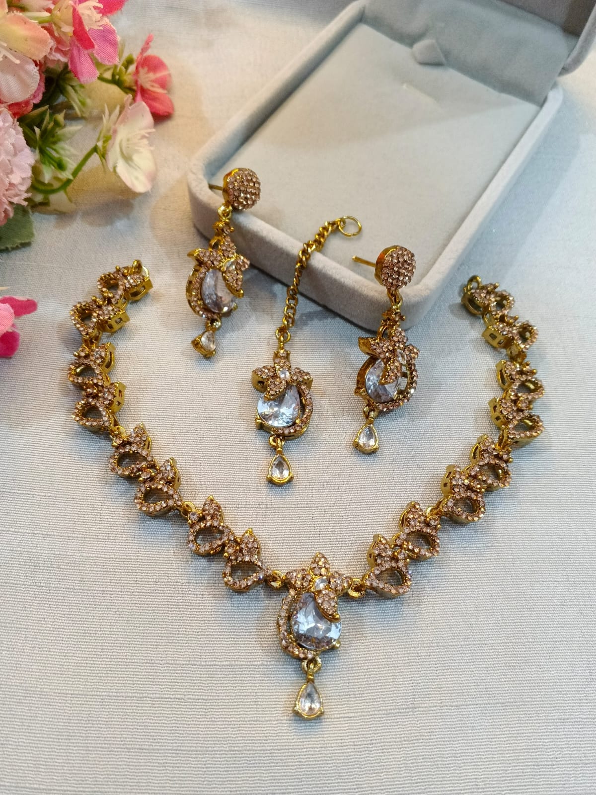 Brown polish zircon necklace set with earrings and tikka, crystal white stones