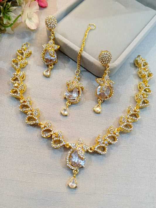 Gold polish zircon necklace set with earrings and tikka, crystal white stones