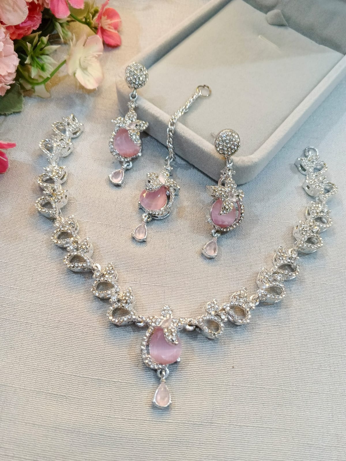 Silver zircon necklace set with earrings and tikka, blush pink stones